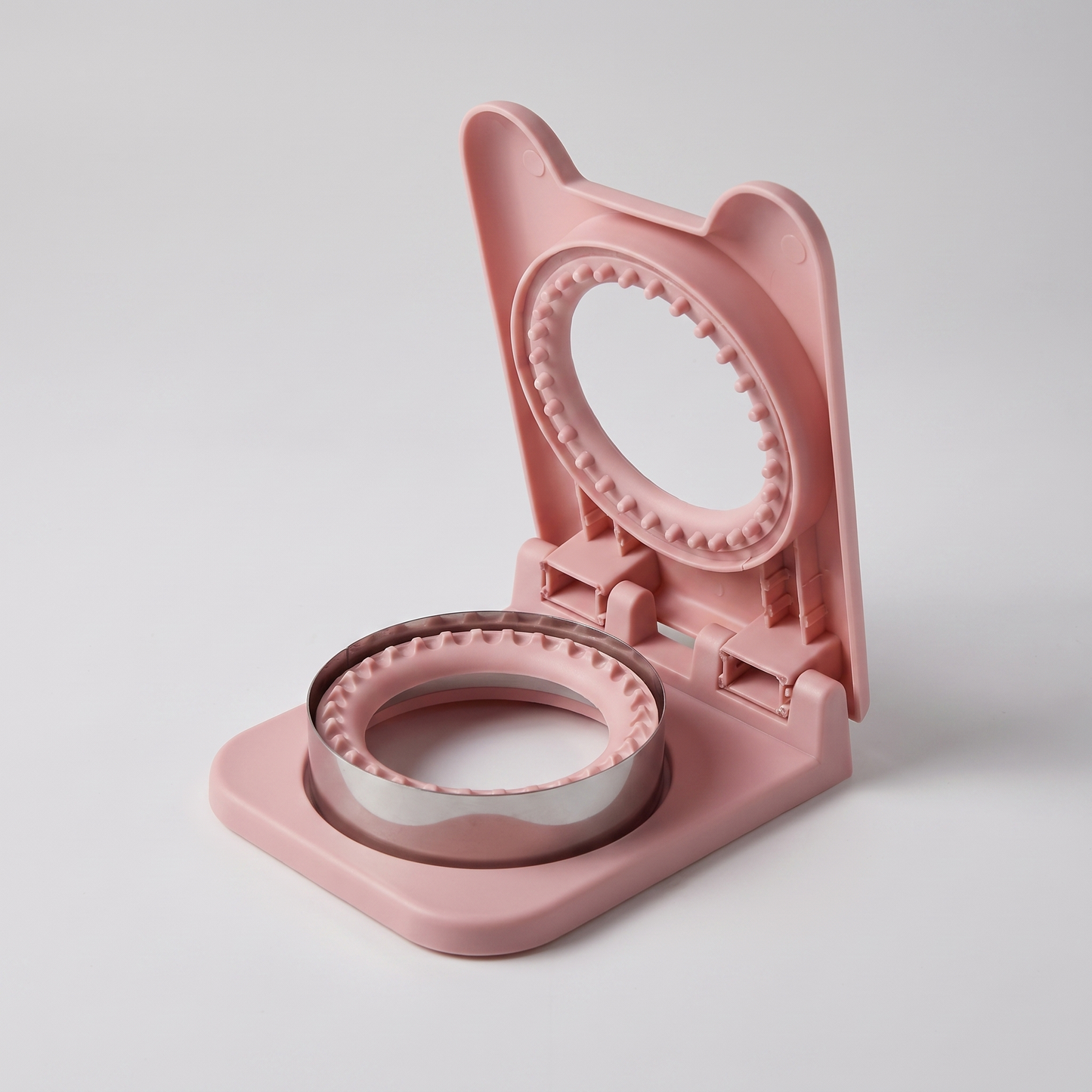 Round sandwich maker and sealer angled view
